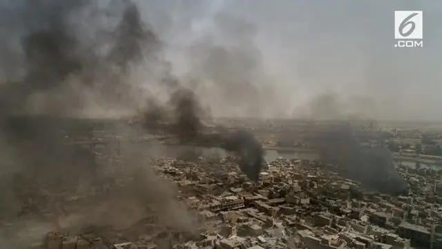 Asap Hitam Muncul di Mosul, Setelah ISIS Dipukul Mundur