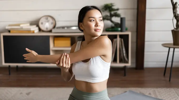 wanita november olahraga stretching