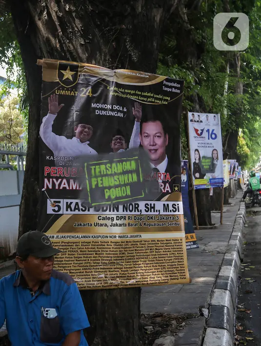 Patut diketahui, paku yang ditancapkan pada batang pohon berpotensi merusak. (Liputan6.com/Angga Yuniar)