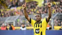 Youssoufa Moukoko menjadi pemain termuda di Piala Dunia 2022, yaitu 17 tahun. Ia terpilih masuk ke squad Timnas Jerman setelah tampil memukau bersama Borussia Dortmund. Moukoko tercatat telah mencetak 6 gol dari 22 penampilannya di semua ajang. (AFP/Ina Fassbender)