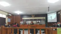 Ahli pidana memberi keterangan dalam sidang bupati bengkalis Amril Mukminin di Pengadilan Tipikor Pekanbaru. (Liputan6.com/M Syukur)