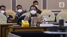 Mendagri Tito Karnavian saat rapat kerja bersama Pansus RUU Perubahan Kedua atas UU Nomor 21 Tahun 2001 tentang Otonomi Khusus bagi Provinsi Papua, Kompleks Parlemen, Jakarta, Kamis (8/4/2021). Rapat mendengar penjelasan pemerintah, pengesahan jadwal Pansus dan mekanisme. (Liputan6.com/Angga Yuniar)