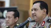 Kabagpenum Polri Brigjen Rikwanto memberi keterangan pers terkait penangkapan terduga teroris Jatiluhur di Jakarta, Senin (26/12). Tim Densus 88 menyergap 4 teroris 2 pelaku ditembak mati dan 2 pelaku ditangkap hidup-hidup. (Liputan6.com/Faizal Fanani)