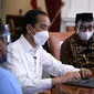 Presiden Jokowi melaporkan SPT Tahunan melalui aplikasi daring e-filling, di Istana Merdeka, Jakarta, Rabu (03/03/2021). (Foto: Biro Pers Setpres/Lukas)