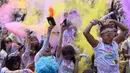 Colour Run mirip dengan Festival Holi atau festival warna yang digelar masyarakat India pada tiap masuknya musim semi. (JADE GAO/AFP)