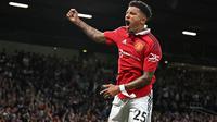 Jadon Sancho. Sayap kiri Inggris berusia 22 tahun ini menjadi pemain termahal keempat dalam Derby Manchester edisi terbaru. Jadon Sancho didatangkan Manchester United pada awal musim 2021/2022 dari Borussia Dormund dengan nilai transfer 85 juta euro atau kini setara Rp1,39 triliun. Dalam Derby Manchester di Liga Inggris ia selalu tampil dalam 3 kesempatan dengan torehan 1 gol. (AFP/Paul Ellis)