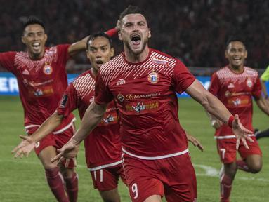 Striker Persija Jakarta, Marko Simic, melakukan selebrasi usai mencetak gol ke gawang  Bali United pada final Piala Presiden di SUGBK, Jakarta, Sabtu (17/2/2018). Persija menang 3-0 atas Bali United. (Bola.com/M Iqbal Ichsan)