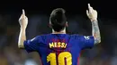 Pemain Bacelona, Lionel Messi melakukan selebrasi usai berhasil mencetak gol ke gawang Juventus pada babak penyisihan Grup D Liga Champions di Camp Nou, Selasa (13/9). Lionel Messi jadi bintang di laga ini dengan torehan dua gol. (AP Photo/Francisco Seco)