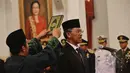 Kepala Badan Pengawasan Keuangan dan Pembangunan (BPKP) Ardan Adiperdana saat pengambilan sumpah jabatan di Istana Negara, Jakarta, Jumat (13/3/2015). (Liputan6.com/Faizal Fanani)