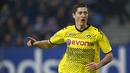 1. Robert Lewandowski - Didatangkan pada musim 2010/2011 dengan harga 3,3 juta poundsterling, striker asal Polandia itu menjelma menjadi mesin pencetak gol. Bersama Dortmund dirinya mencetak 103 gol dari 187 pertandingan. (AFP/John Macdougall)