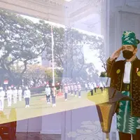 Jokowi mengenakan pakaian adat Tanah Bumbu saat menghadiri upacara Hari Pancasila (Foto:instagram/jokowi)