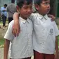 Kisah bocah kembar Pekanbaru yang putus sekolah memancing kenangan masa lalu Bupati Pelalawan saat kehilangan anaknya. (Liputan6.com/M Syukur)