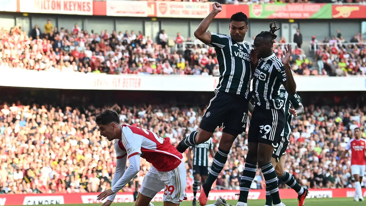 Manchester United kalah 1-3 dari Arsenal.