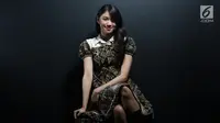 Personel JKT48's Team KIII Shani Indira Natio atau Shani saat berkunjung ke kantor Liputan6.com, SCTV Tower, Jakarta, Senin (17/7). (Liputan6.com/Fatkhur Rozaq)