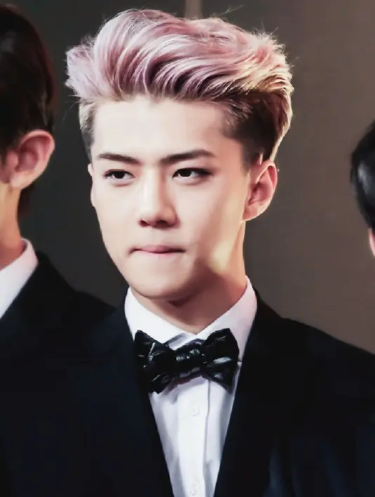 Saat tampil di layar kaca, Sehun EXO kerap mengatupkan bibirnya. (Foto: twitter.com/kpoplover727)