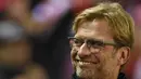 Pelatih Liverpool tersenyum usai laga Piala Liga Inggris melawan Bournemouth di Stadion Anfield, Inggris, Rabu (28/10/2015). (AFP Photo/Paul Ellis)