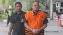 Kasubbag Protokoler nonaktif Kota Medan, Syamsul Fitri Siregar tiba untuk pemeriksaan di Gedung KPK, Jakarta, Senin (13/1/2020). Syamsul diperiksa sebagai tersangka kasus dugaan suap yang melibatkan Wali Kota Medan Dzulmi Eldin dari dinas-dinas di lingkungan Pemkot Medan. (merdeka.com/Dwi Narwoko)