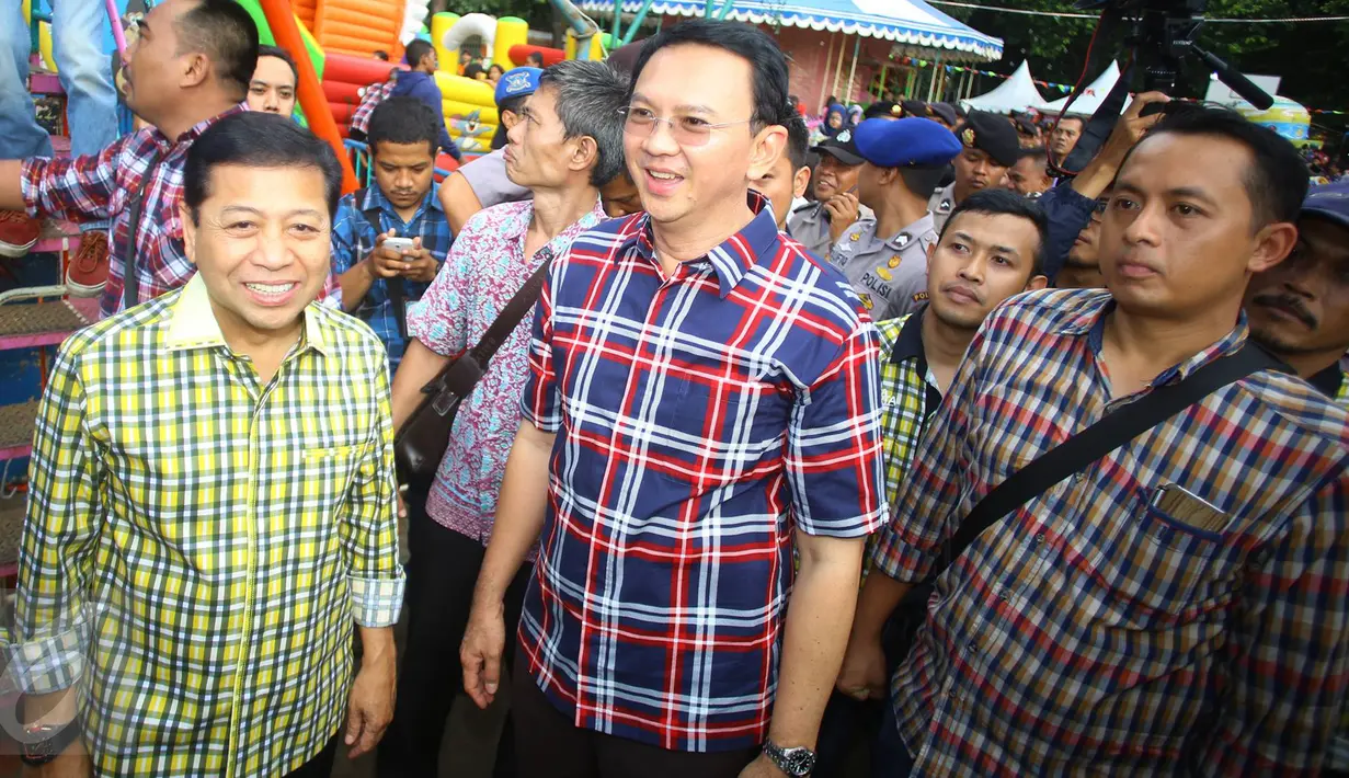 Calon Gubernur DKI Jakarta nomor urut dua, Basuki Tjahaja Purnama, bersama Ketua Umum Partai Golkar Setya Novanto menghadiri acara "Bersyukur Jakarta", Jumat (20/1). (Liputan6.com/Immanuel Antonius)
