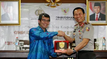 Ombudsman dan Kepolisian Negara RI memperpanjang MoU Penyelesaian Laporan dan Pengaduan Masyarakat, (9/9/14). (Liputan6.com/Andrian M Tunay)