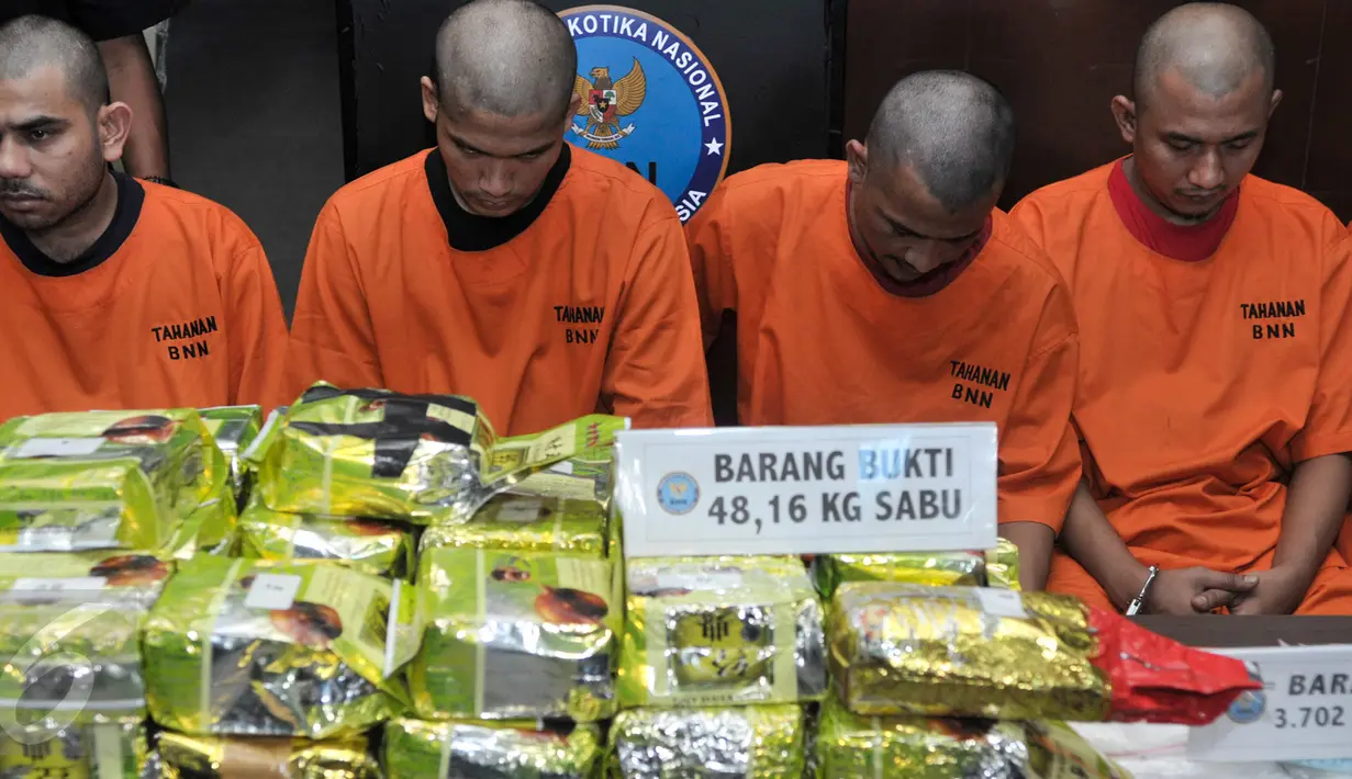 BNN mengungkap peredaran Narkoba jaringan Internasional jaringan Tiongkok -Indonesia di Jakarta, Selasa (7/3). Dari pengungkapan petugas mengamankan barang bukti 48,16 kg sabu, 3.702 butir ekstasi dan 454 butir Happy Five. (Liputan6.com/Yoppy Renato)
