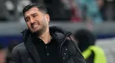 Borussia Dortmund kembali telan kekalahan untuk ketiga kalinya secara beruntun di Bundesliga. Kali ini, tim asuhan Nuri Sahin takluk dari tuan rumah Eintracht Frankfurt dengan skor 2-0, Sabtu (18/1/2025) dini hari WIB. (AP Photo/Michael Probst)