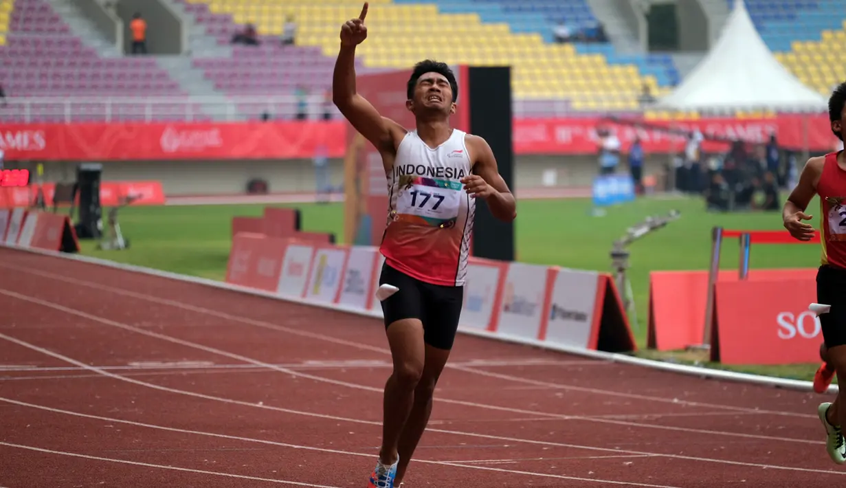 Eko Saputro meraih emas lari 200 meter putra kelas T12 pada ASEAN Para Games 2022 di Stadion Manahan Solo, 2 Agustus 2022. (Foto: Dok. ASEAN Para Sports Federation)