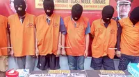 Para tersangka kasus narkoba ditahan di Mapolres Malang Kota, Jawa Timur (Liputan6.com/Zainul Arifin)