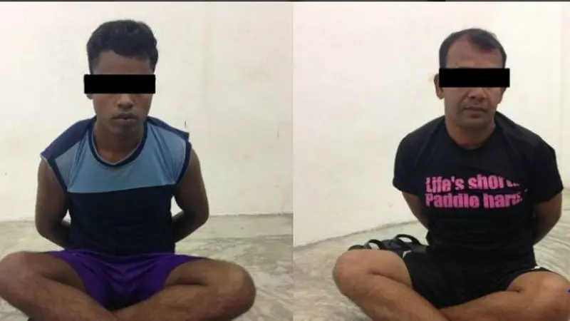 Dua warga Bangladesh yang tertangkap berenang ke Singapura. (Immigration and Checkpoints Authority)