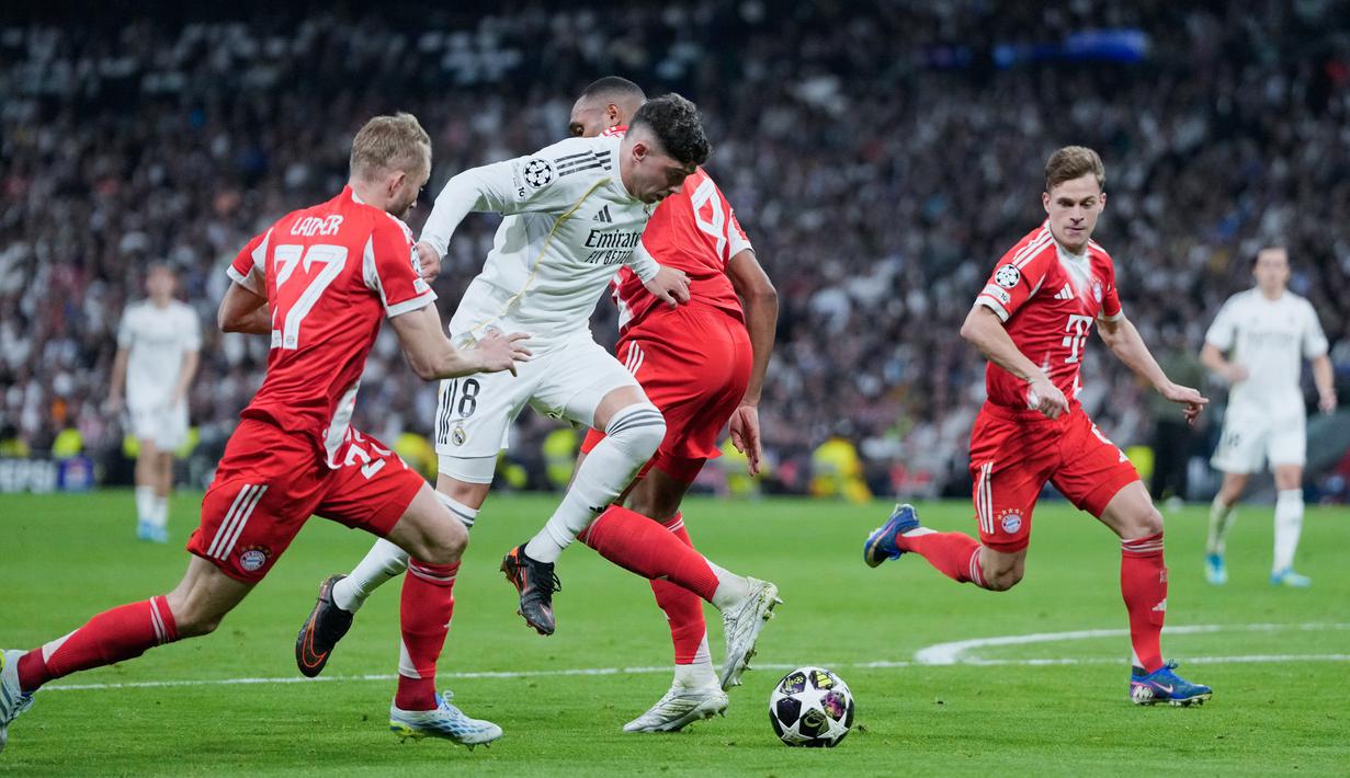 Bayern tampil efektif dan menciptakan banyak peluang sepanjang pertandingan. Sementara itu, skuad Los Blancos baru mampu memberi perlawanan serius di babak kedua. (AP Photo/Bernat Armangue)