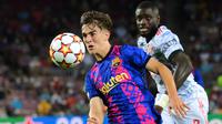 Gavi - Pemain jebolan La Masia ini mencuri perhatian saat memecahkan rekor pemain termuda di Timnas Spanyol. Talenta muda yang digadang-gadang penerus Xavi di Barcelona itu memiliki banderol 25 juta euro pada musim pertamanya. (AFP/Lluis Gene)