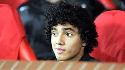 Manchester United&#039;s Rafael Da Silva sits on the substitutes bench before their UEFA Champions League Group E match against Celtic at Old Trafford in Manchester, on October 21, 2008. AFP PHOTO/ANDREW YATES