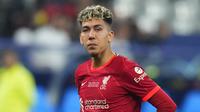 Ekspresi pemain Liverpool Roberto Firmino setelah pertandingan sepak bola final Liga Champions antara Liverpool dan Real Madrid di Stade de France, Saint Denis, Prancis, 28 Mei 2022. Real Madrid menang 1-0. (AP Photo/Petr David Josek)