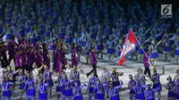 Kontingen Kamboja melintas saat pembukaan Asian Games 2018 di Stadion Utama Gelora Bung Karno (SUGBK), Jakarta, Sabtu (18/8). Asian Games 2018 diikuti 45 negara. (Merdeka.com/Imam Buhori)