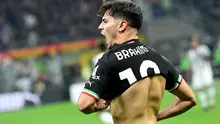 Brahim Diaz berhasil mencetak satu gol dan membantu AC Milan meraih kemenangan 2-0 atas Juventus pada laga pekan kesembilan Serie A di San Siro, Sabtu (8/10/2022) malam WIB. (AFP/Isabella BONOTTO)