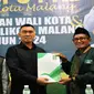 Mochamad Anton (baju hitam) pada Senin, 29 April 2024 mendaftar sebagai Bakal Calon Wali Kota Malang dalam Pilkada 2024 lewat PKB (Liputan6.com/Zainul Arifin)