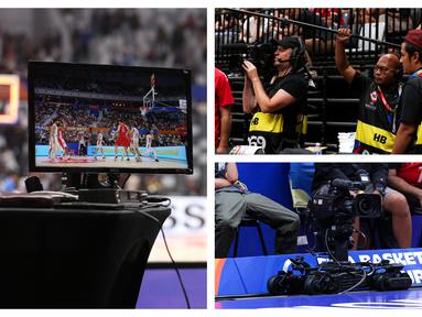 Para pencinta bola basket tak hanya mempu menikmati Piala Dunia FIBA 2023 dari arenanya langsung. Mereka juga bisa menyaksikan seluruh laga dari layar kaca. Tayangannya pun dikemas dengan kualitas dunia. Banyak sudut-sudut pengambilan gambar yang kadang tak bisa terlihat jika menonton langsung. Hal tersebut berkat didukung teknologi canggih penyiarannya. Berikut ini potret beberapa teknologi canggih penyiaran Piala Dunia FIBA 2023. (Bola.com/Bagaskara Lazuardi)