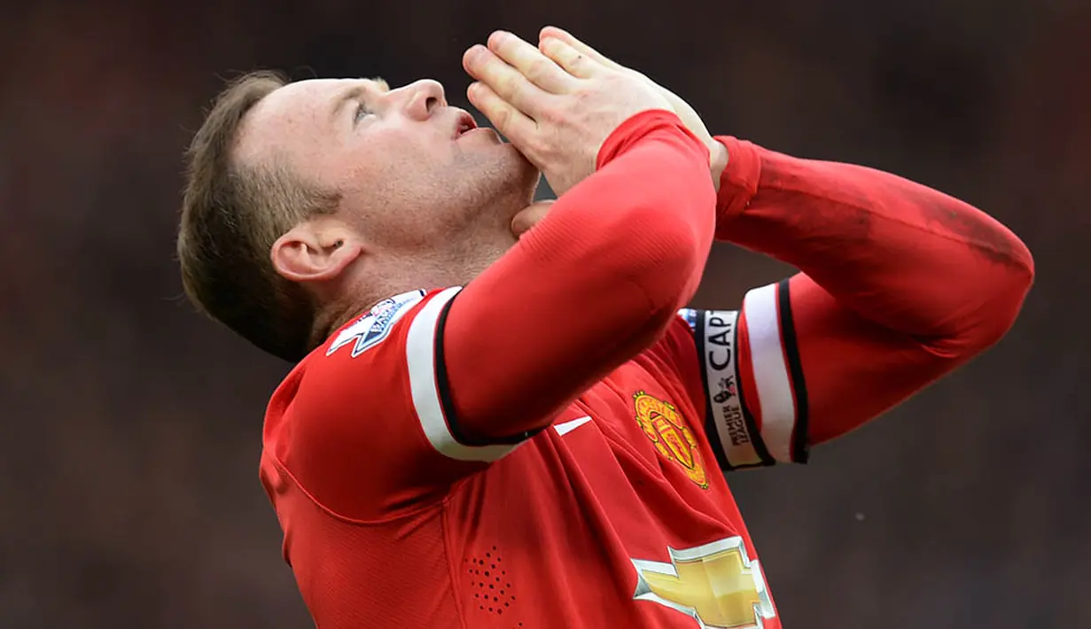 Manchester United akhirnya berhasil kembali ke Liga Champions. Setan Merah berada pada posisi empat klasemen akhir Premier League musim 2014/2015. (AFP/Oli Scarff)