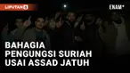Di tengah cuaca dingin, puluhan pengungsi Suriah berkumpul di gerbang perbatasan Cilvegozu, Turki, Senin (9/12), menanti kesempatan pulang ke tanah air mereka setelah rezim Bashar Assad tumbang.