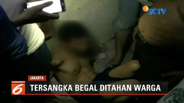 Warga Buaran, Jakarta Timur, gagalkan aksi jambret yang mengincar pada seorang pengendara beserta anak dan istrinya.