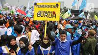 Ketika itu, para pekerja menuntut adanya pengurangan jam kerja menjadi delapan jam sehari tanpa pengurangan upah. (Liputan6.com/Angga Yuniar)