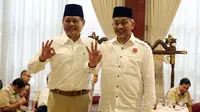 Pasangan Cagub Jawa Barat dari Partai Koalisi Asyik, Sudrajat-Ahmad Syaikhu saat pertemuan dengan Partai Gerindra, Jakarta, Kamis (1/3). Pertemuan membahas kesiapan Pilkada Jabar yang akan dilaksanakan serentak, 27 Juni 2018. (Liputan6.com/Johan Tallo)