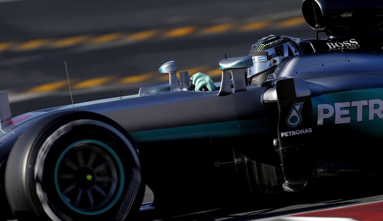 Nico Rosberg dari Mercedes mencatat waktu tercepat yaitu 1m23,022s dari 82 lap pada sesi tes pramusim kedua di Sirkuit Catalunya, Barcelona, selasa (2/3/2016) malam WIB. (EPA/Alejandro Garcia)