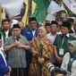 Pasangan Sudirman Said dan Ida Fauziah memberi keterangan saat mendaftar sebagai Cagub dan Cawagub Jawa Tengah di KPUD Jateng, Rabu (10/1). Pasangan ini didukung oleh Partai Gerinda, PKS , PKB dan PAN. (Liputan6.com/Gholib)