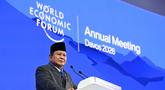 Presiden Indonesia, Prabowo Subianto saat menyampaikan pidato khusus (special address) pada pertemuan tahunan Forum Ekonomi Dunia (WEF) di Davos, Swiss, pada Kamis 22 Januari 2026. Presiden Republik Indonesia, Prabowo Subianto memaparkan sejumlah konsep ekonomi yang telah dipikirkan dan diterapkan, termasuk Makan Bergizi Gratis (MBG) dan Cek Kesehatan Gratis (CKG). (Fabrice COFFRINI/AFP)