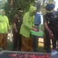 Jaksa Agung Muhammad Prasetyo melakukan upacara dan ziarah di Taman Makam Pahlawan (TMP) Kalibata, Jakarta Selatan, Minggu (21/7/2019).(Merdeka/com/ Nur Habibie)