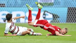 Penampilan disiplin Hungaria benar-benar membuat sang juara bertahan Portugal kesulitan menembus lini pertahanan lawan. (Tibor Illyes/Pool via AP)