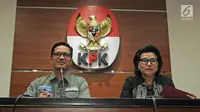 Jubir KPK Febri Diansyah dan Wakil Ketua KPK Basaria Panjaitan saat konfrensi pers di Jakarta, Jumat (2/2). Selain Zumi Zola, KPK juga menetapkan PLT Kepala Dinas Pekerjaan Umum Provinsi Jambi Arfan sebagai tersangka. (Liputan6.com/Herman Zakharia)