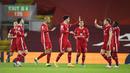 Para pemain Liverpool merayakan gol ke gawang Leicester City pada laga Liga Inggris di Stadion Anfield, Senin (23/11/2020). Liverpool menang dengan skor 3-0. (Peter Powell/Pool via AP)