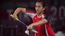 Memasuki gim kedua, Praveen Jordan/Melati Daeva Oktavianti tampil lebih tenang dan tidak terburu-buru. Kesalahan yang banyak dilakukan Melati di gim pertama mulai dikikis hingga berhasil unggul 21-17. (Foto: AFP/Pedro Pardo)