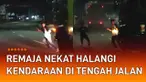 Aksi remaja menghalangi kendaraan besar di tengah jalan kembali terjadi.